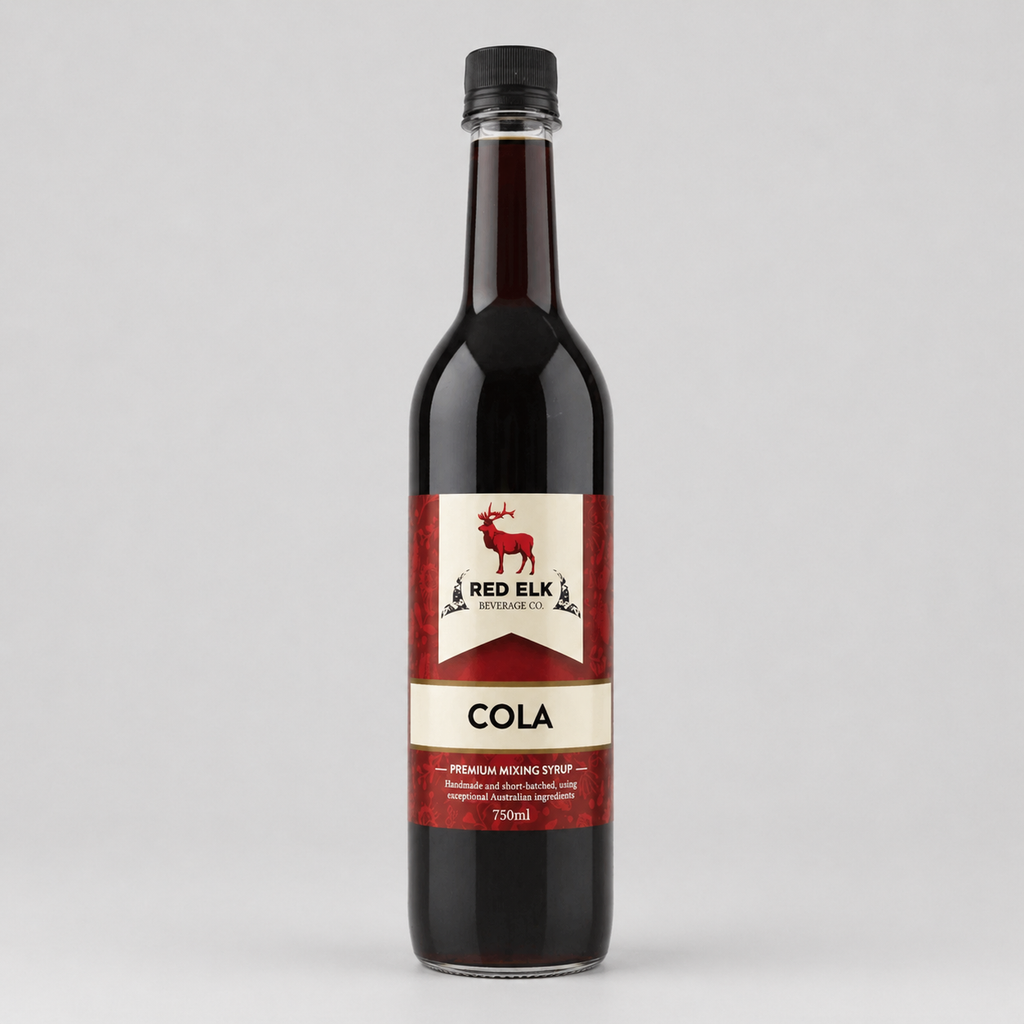 Bottle of Red Elk Cola syrup on a gray background