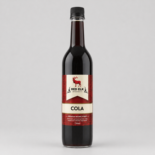 Bottle of Red Elk Cola syrup on a gray background