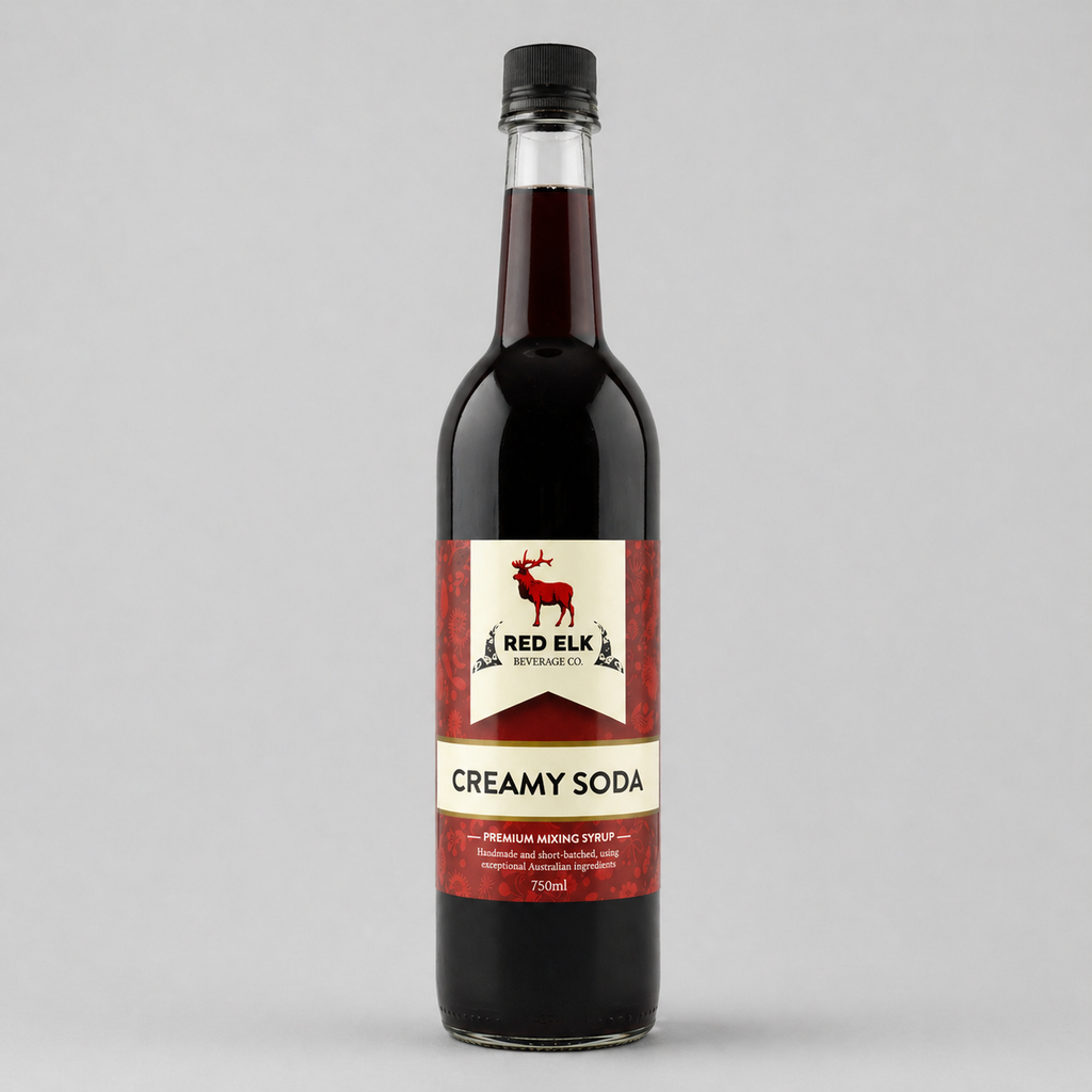 Bottle of Red Elk Creamy Soda on a gray background