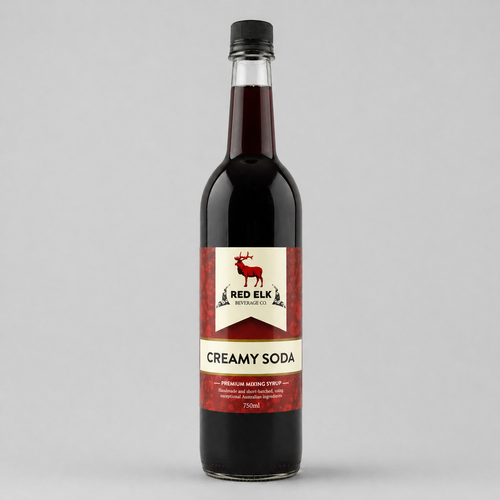Bottle of Red Elk Creamy Soda on a gray background