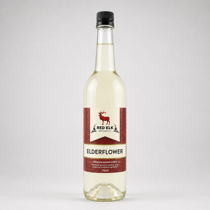 Bottle of Red Elk Elderflower syrup on a white background