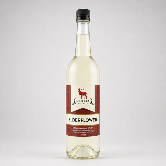 Bottle of Red Elk Elderflower syrup on a white background