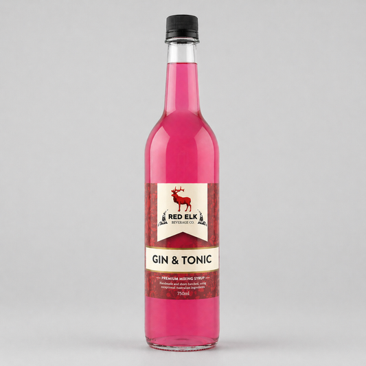 Bottle of Red Elk Gin & Tonic syrup on a gray background