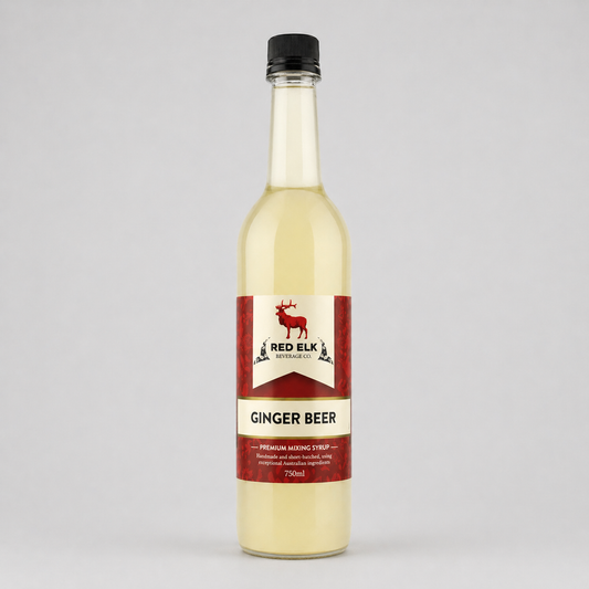 Bottle of Red Elk Ginger Beer syrup on a gray background