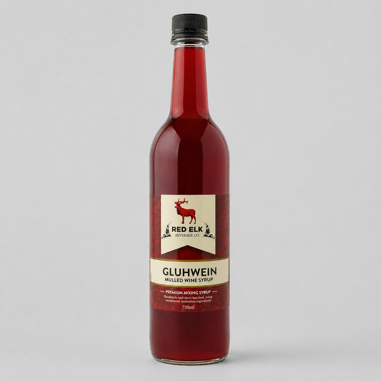 Bottle of Red Elk Gluhwein syrup on a gray background