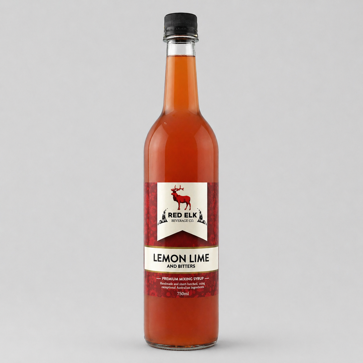 Bottle of Red Elk Lemon Lime and Bitters syrup on a gray background
