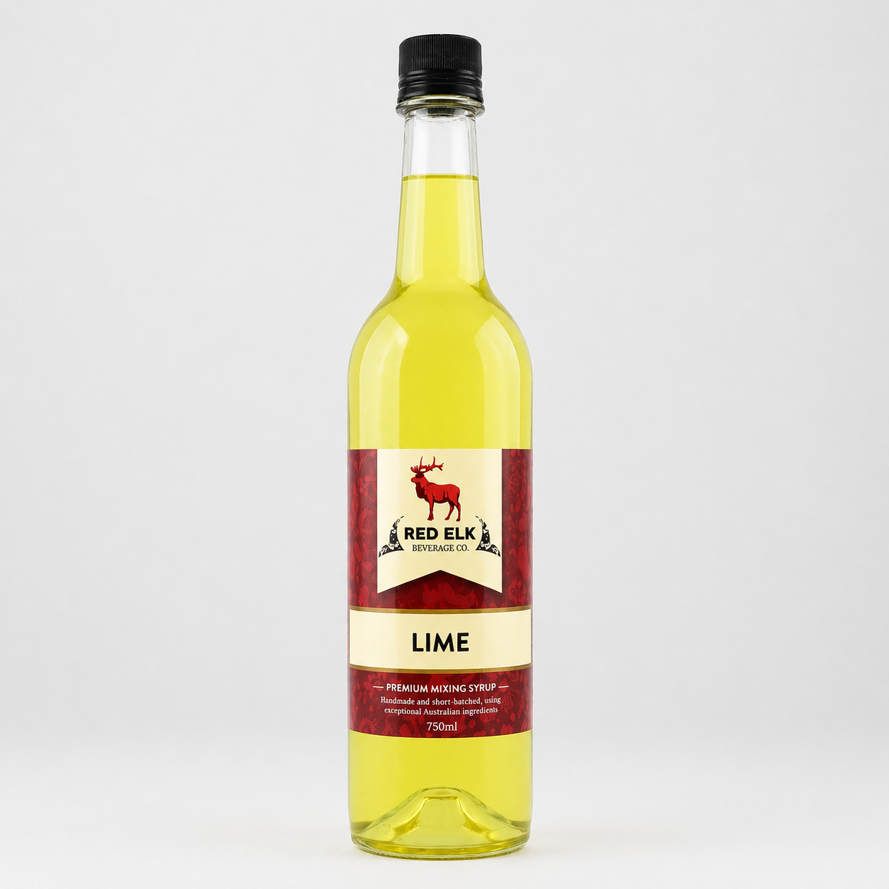 Bottle of Red Elk Lime syrup on a white background