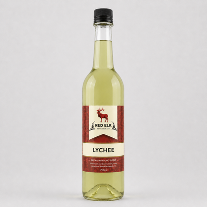 Bottle of Red Elk Lychee syrup on a light gray background
