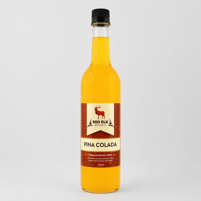 Bottle of Red Elk Pina Colada syrup on a white background