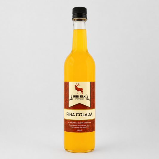 Bottle of Red Elk Pina Colada syrup on a white background