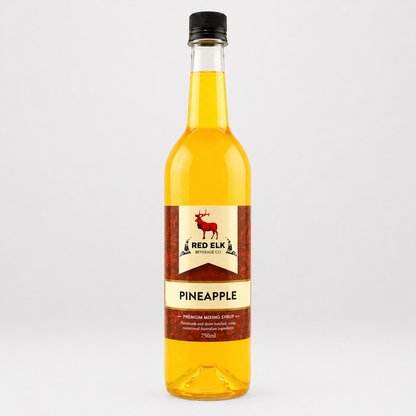 Bottle of Red Elk Pineapple syrup on a white background