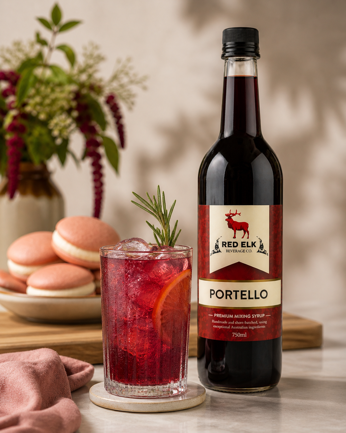 Bottle of Portello syrup with drink and dessert.